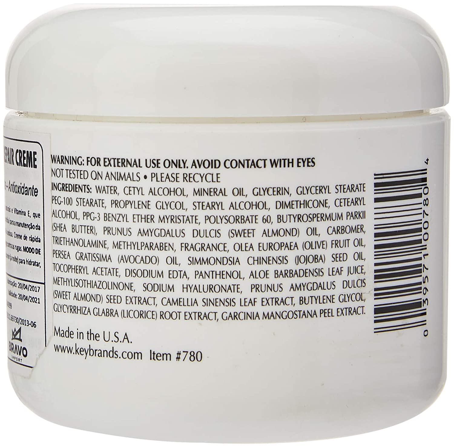 Back of a white jar with text and a barcode on a white background