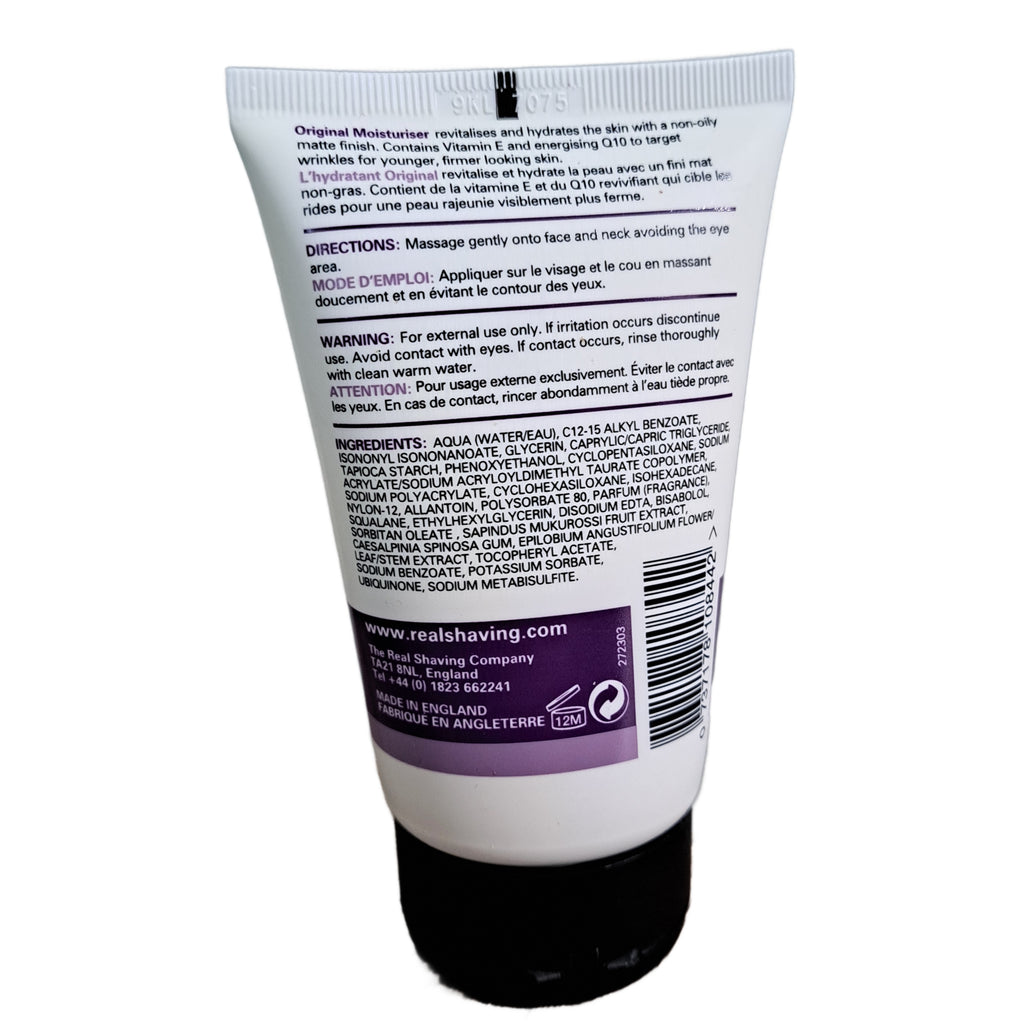Back view of a shaving cream tube with text and branding on a white background