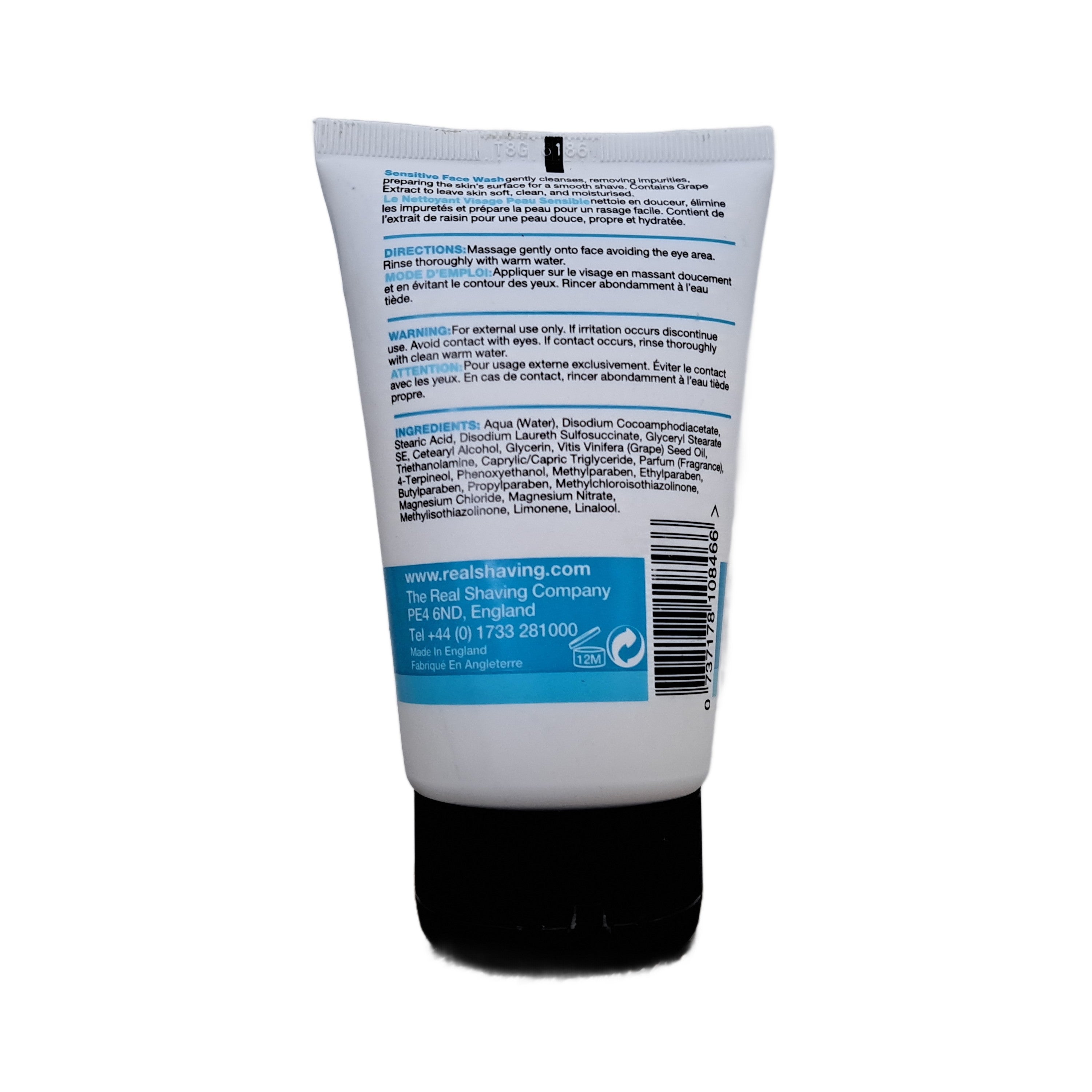 Back view of a skincare product tube with text and branding on a white background